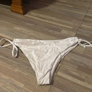 Women’s white bikini bottoms. Size medium